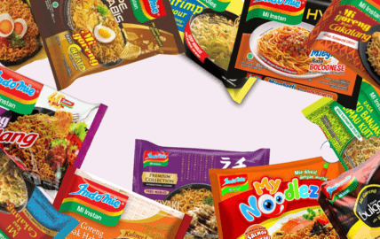 A close-up of Indomie instant noodle seasoning packets, featuring a mix of aromatic spices and savory sauces that elevate the flavor of the noodles.