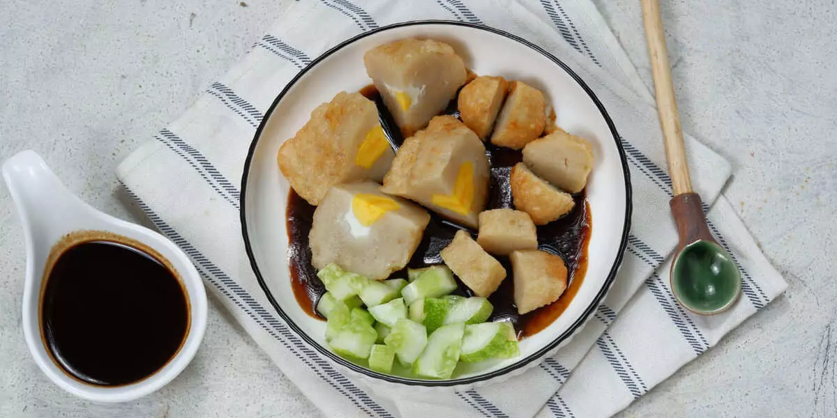 The Pempek: A plate of assorted pempek variations, showcasing the diversity of this Indonesian delicacy.