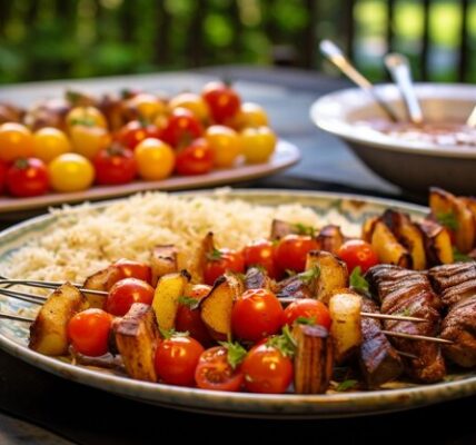 A colorful kebab feast spread with various dips, grilled meats, and roasted vegetables